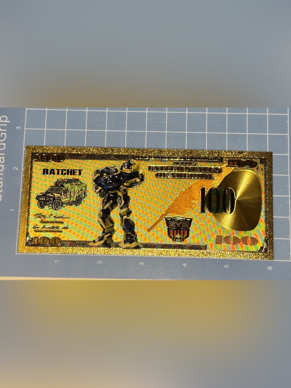 Gold Holographic Transformers Ratchet Collectable Note